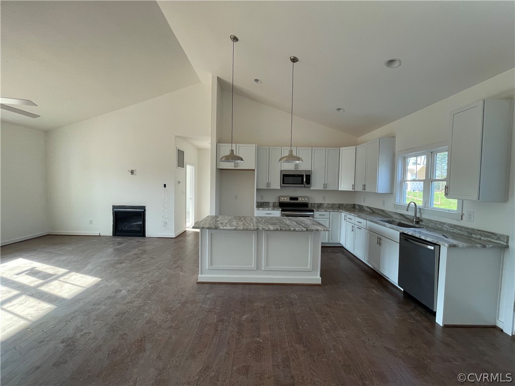3324 Three Chopt Road Gum Spring, VA 23065 - Photo 6 of 43 a large kitchen with cabinets and stainless steel appliances