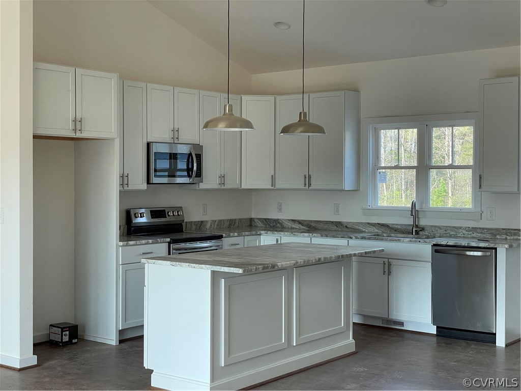 3324 Three Chopt Road Gum Spring, VA 23065 - Photo 7 of 43 a kitchen with stainless steel appliances granite countertop a sink a stove a refrigerator and island with wooden floor