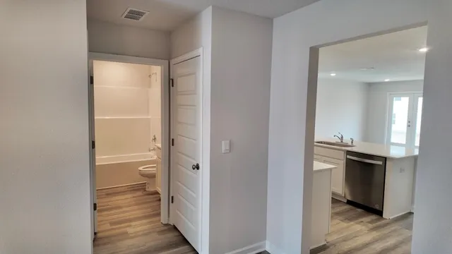 wooden floor and closet in a room