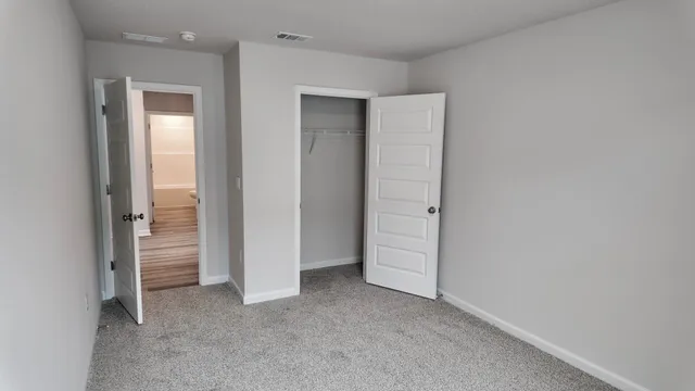 a view of a room with racks on the wall