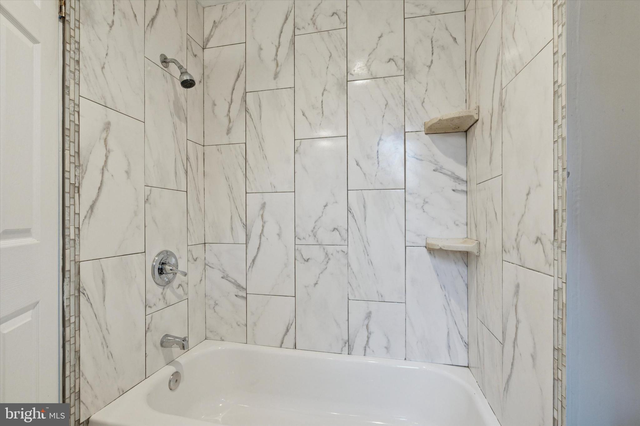 5121 Hadfield Street Philadelphia, PA 19143 - Photo 14 of 19 a bathroom with a bathtub