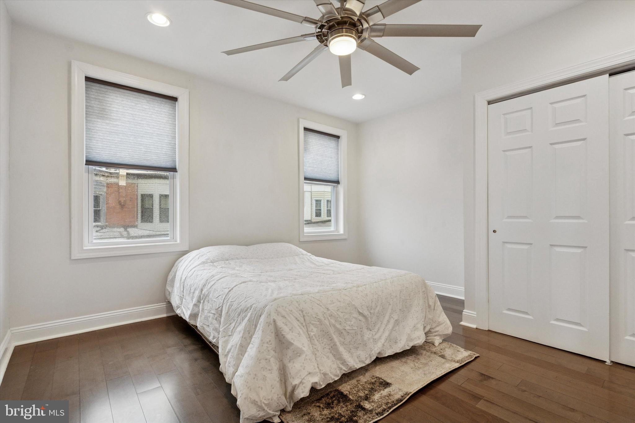 5121 Hadfield Street Philadelphia, PA 19143 - Photo 16 of 19 a bedroom with a large bed and a window