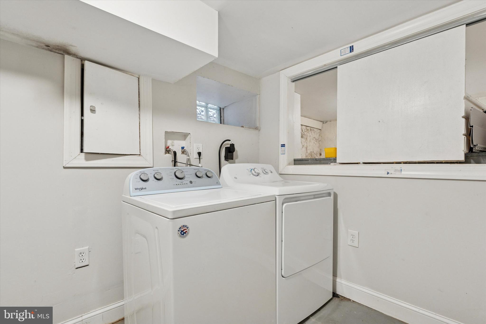 5121 Hadfield Street Philadelphia, PA 19143 - Photo 18 of 19 a bathroom with a sink and a mirror