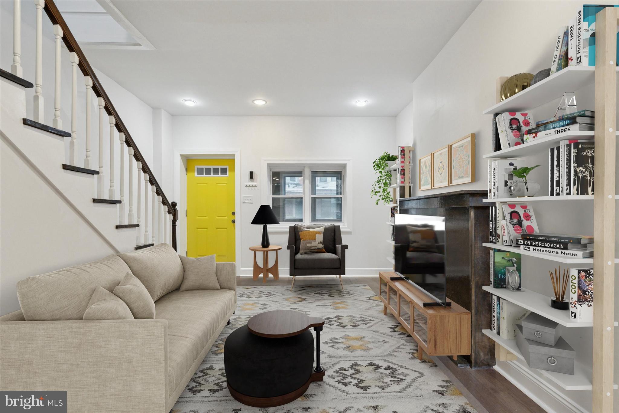 5121 Hadfield Street Philadelphia, PA 19143 - Photo 3 of 19 a living room with furniture and a flat screen tv
