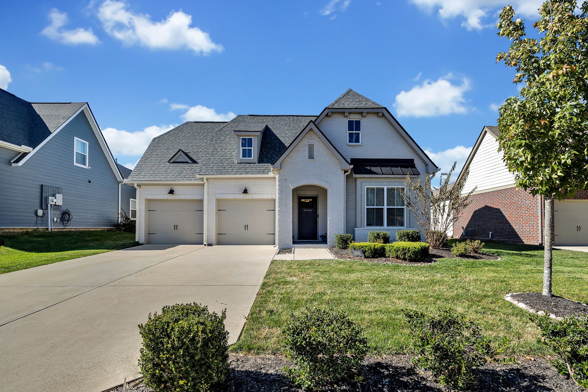 740 Plowson Road Mount Juliet, TN 37122 - Photo 44 of 64 a front view of a house with garden