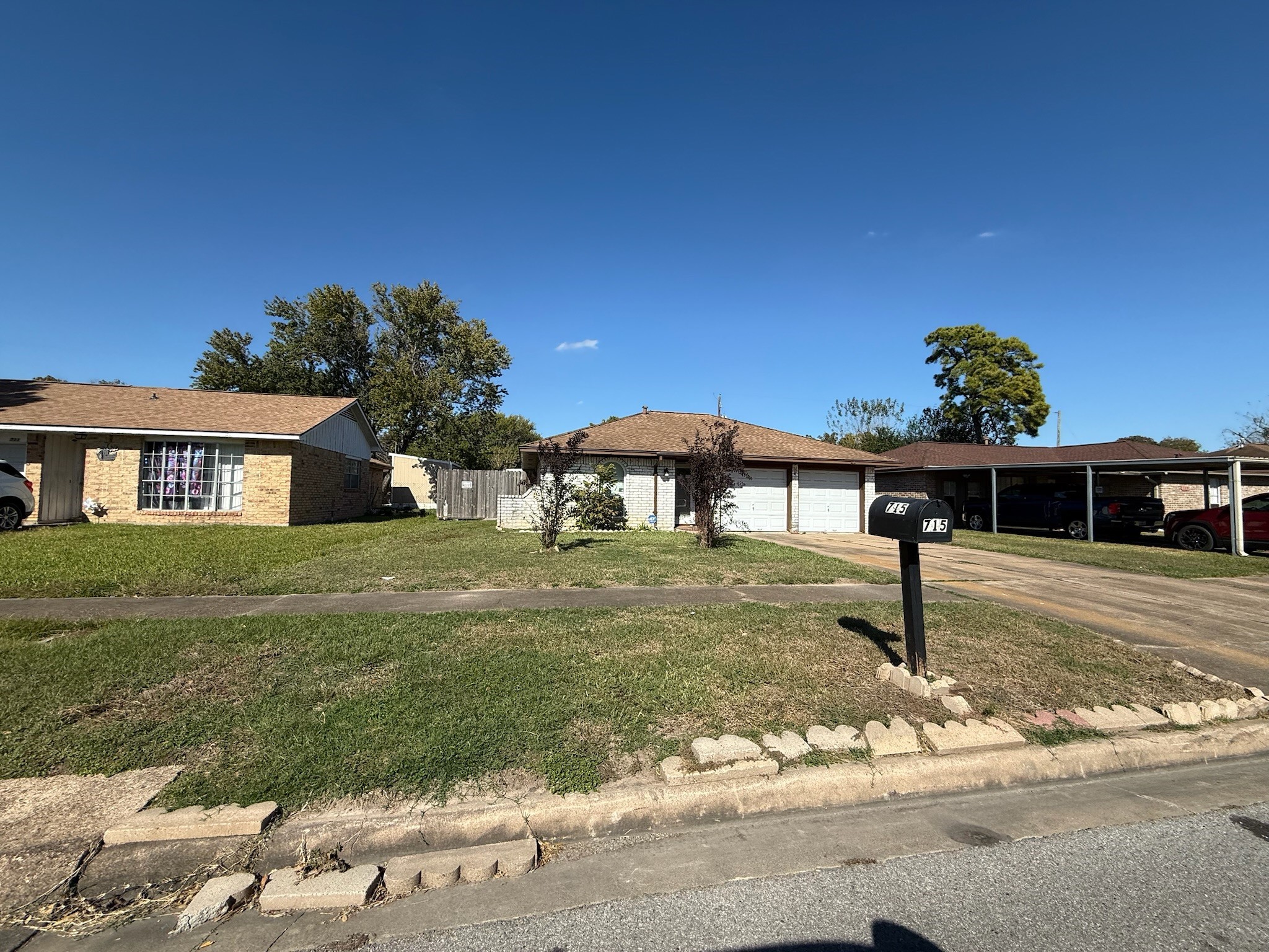 715 Branding Iron Lane Houston, TX 77060 - Photo 1 of 6 a front view of a house with a yard