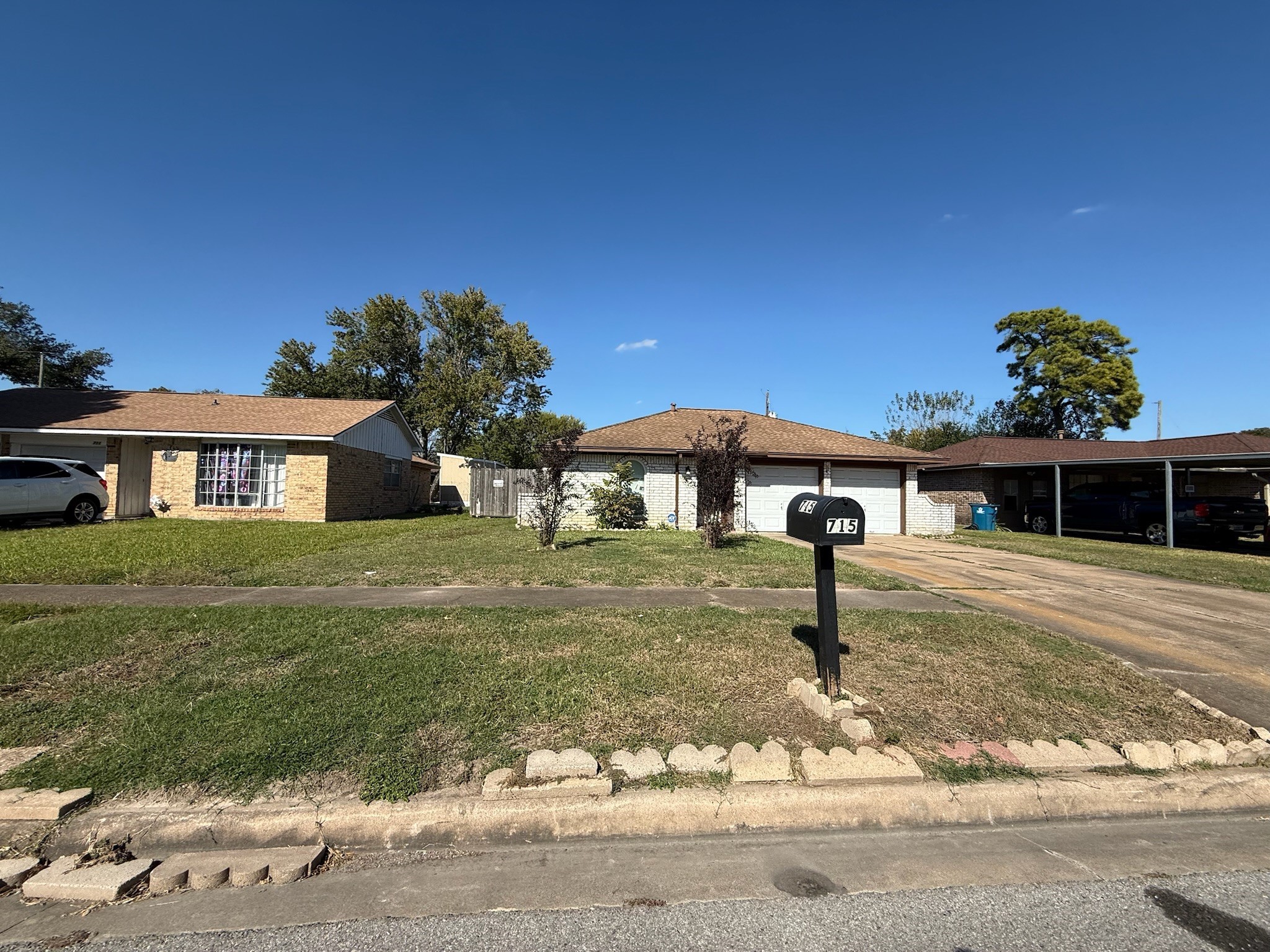 715 Branding Iron Lane Houston, TX 77060 - Photo 2 of 6 a front view of a house with a yard