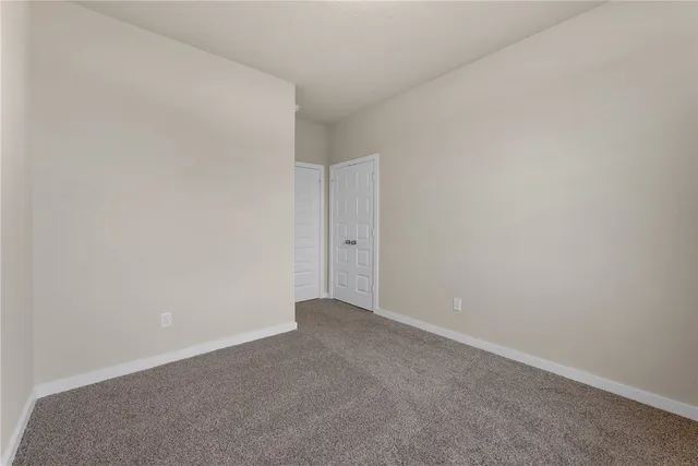 a view of kitchen with cabinets and wooden floor