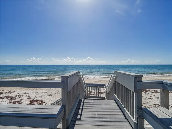 a view of dining room and wooden floor