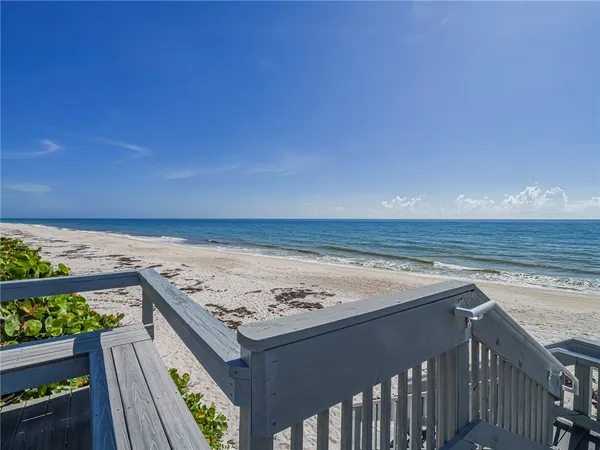 a view of an ocean from a balcony