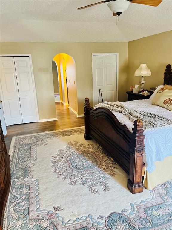 184 Massini Avenue Northwest Palm Bay, FL 32907 - Photo 11 of 15 a bedroom with a bed and a dresser