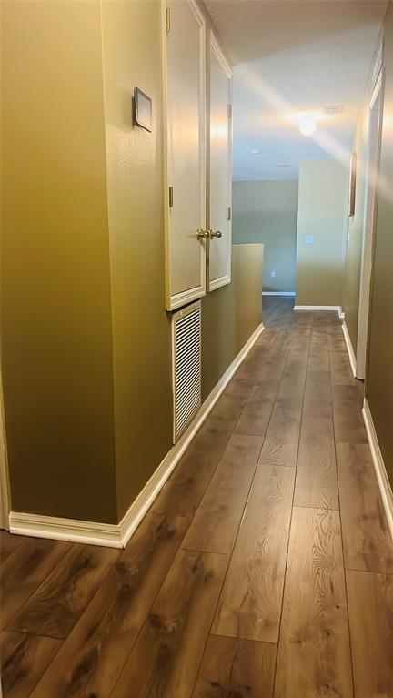184 Massini Avenue Northwest Palm Bay, FL 32907 - Photo 12 of 15 a view of a hallway with wooden floor