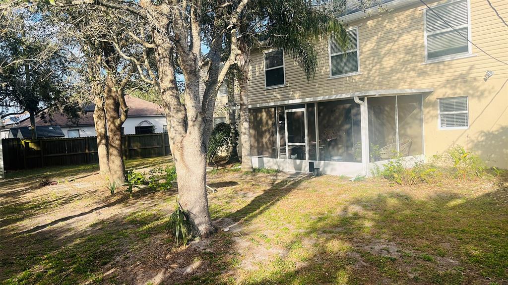 184 Massini Avenue Northwest Palm Bay, FL 32907 - Photo 15 of 15 a view of a house with snow on the road