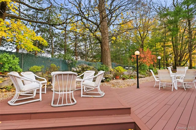 a view of a table and chairs on the deck