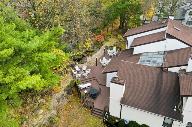 an aerial view of residential house with outdoor space