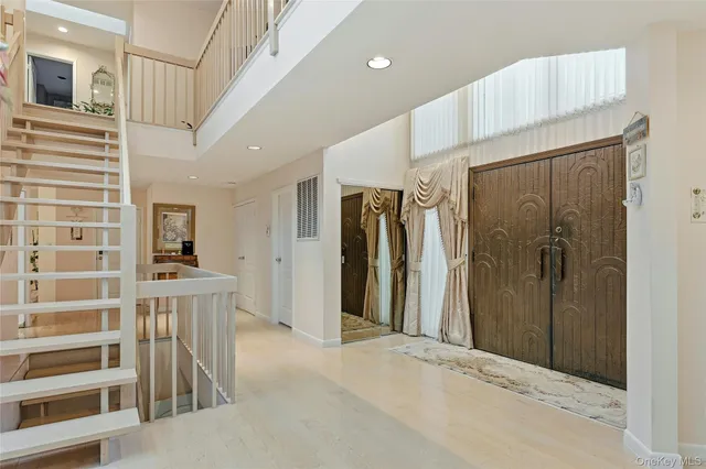 a view of a hallway with a furniture