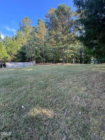 a view of outdoor space and yard