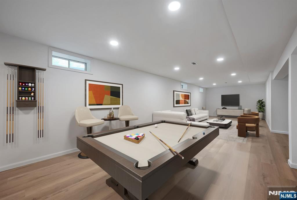 1 Winding Ridge Road Lake Hopatcong, NJ 07849 - Photo 44 of 50 a living room with furniture pool table and a wooden floor