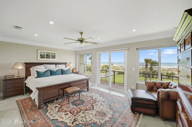 a kitchen with stainless steel appliances white cabinets and a stove top oven
