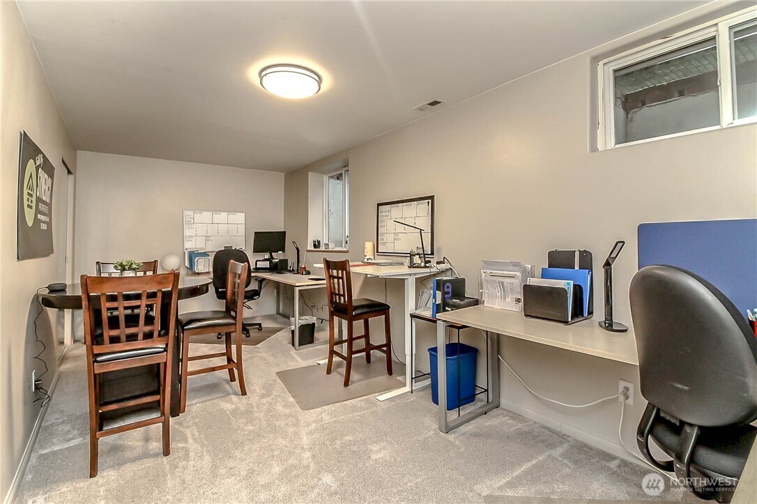 1005 28th Street Southeast, Unit C Auburn, WA 98002 - Photo 14 of 23 a view of a workspace with furniture