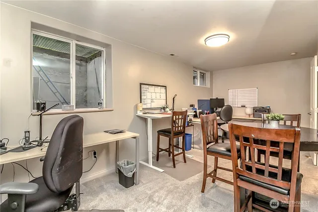 a room with lots of chairs and mirrors