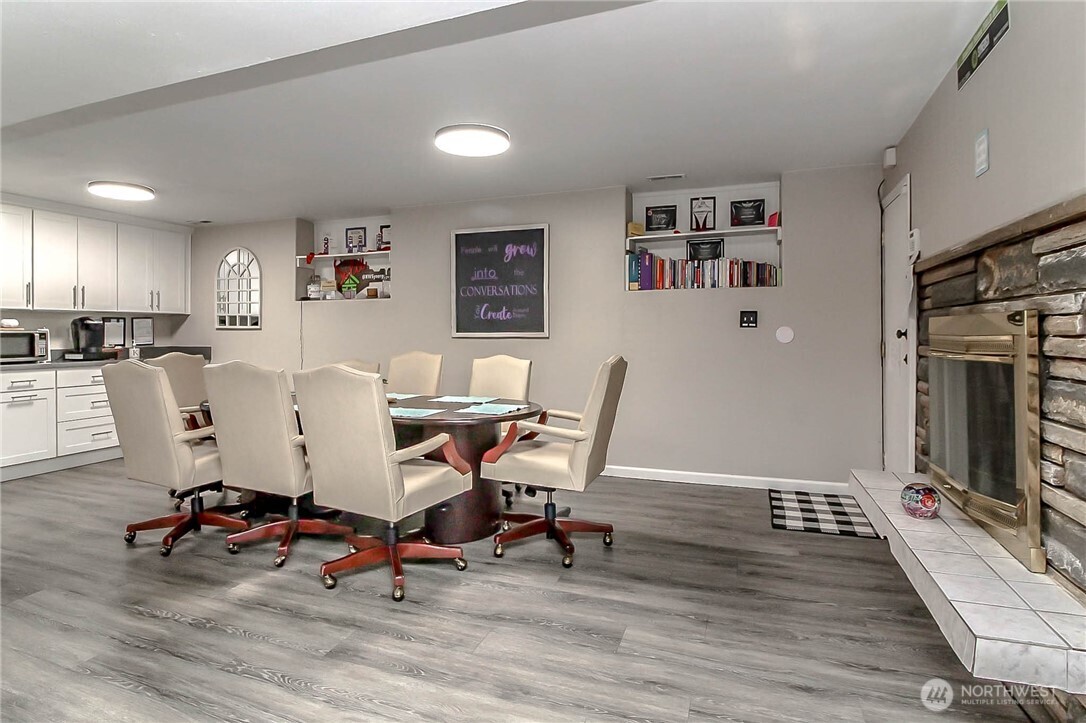 1005 28th Street Southeast, Unit C Auburn, WA 98002 - Photo 10 of 23 a view of a workspace with furniture and a bedroom