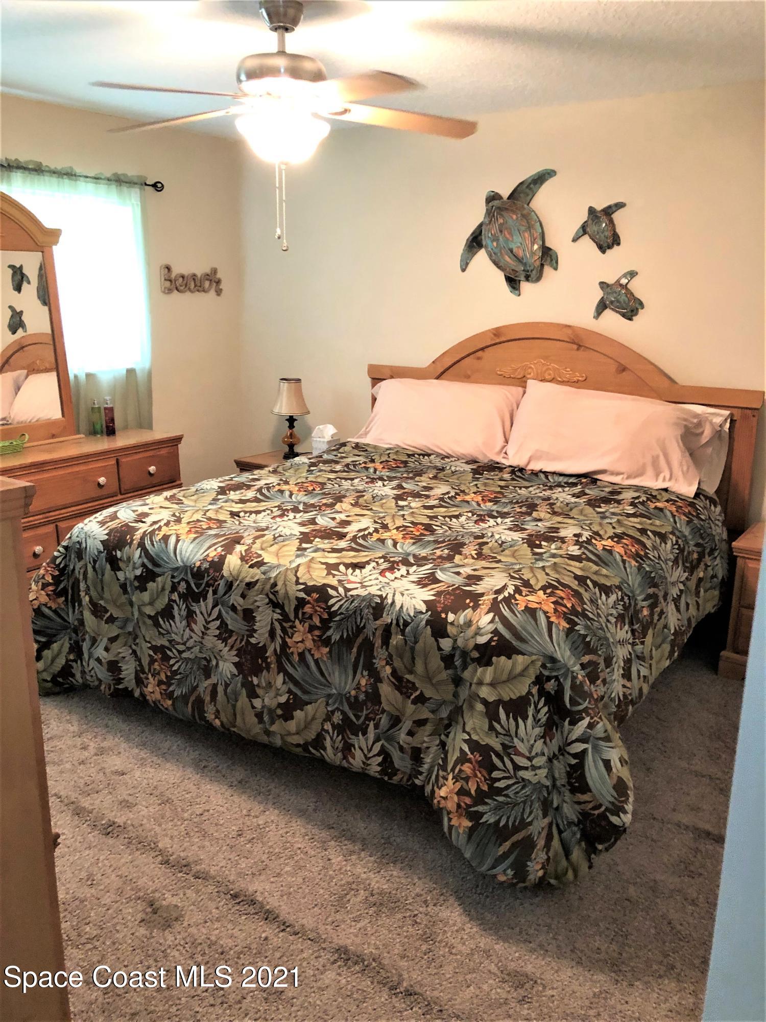 655 Ridge Club Drive, Unit 28 Melbourne, FL 32934 - Photo 3 of 12 Master Bedroom