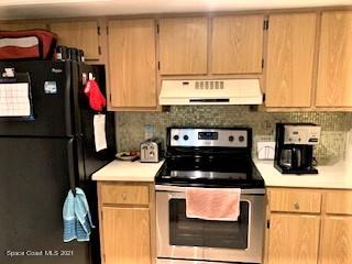 655 Ridge Club Drive, Unit 28 Melbourne, FL 32934 - Photo 5 of 12 kitchen range