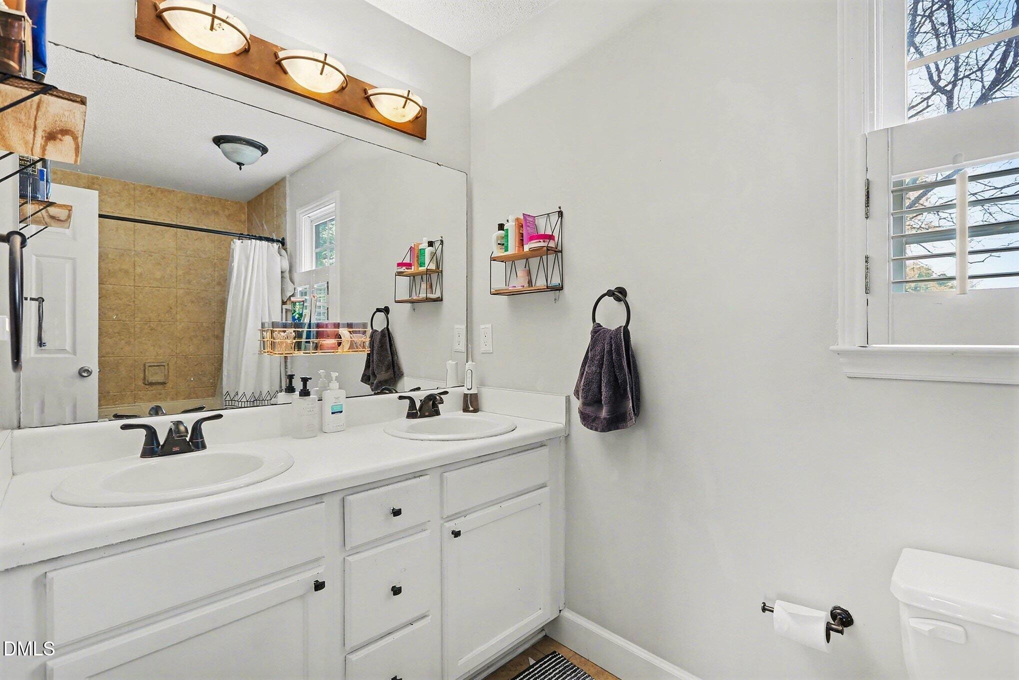 3216 Leebrook Road Raleigh, NC 27616 - Photo 14 of 18 Primary Bath