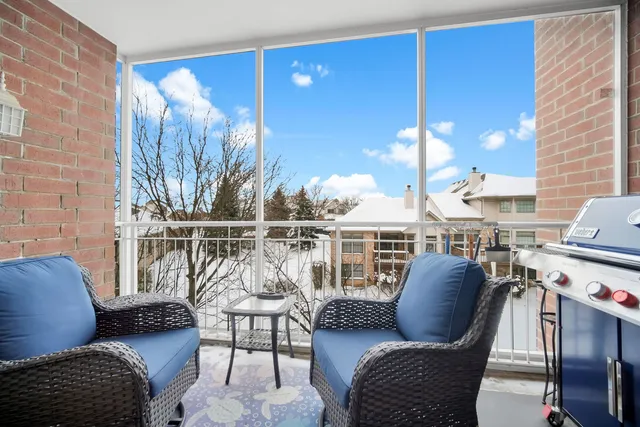 a balcony with furniture