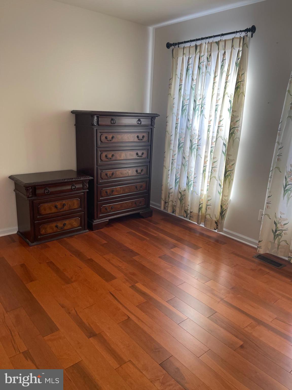 169 Thomas Jefferson Terrace Elkton, MD 21921 - Photo 12 of 19 an empty room with wooden floor and windows