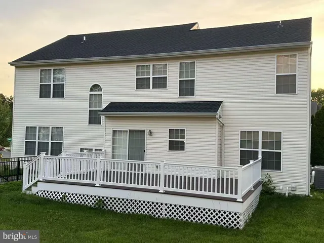 a view of a deck with a fence