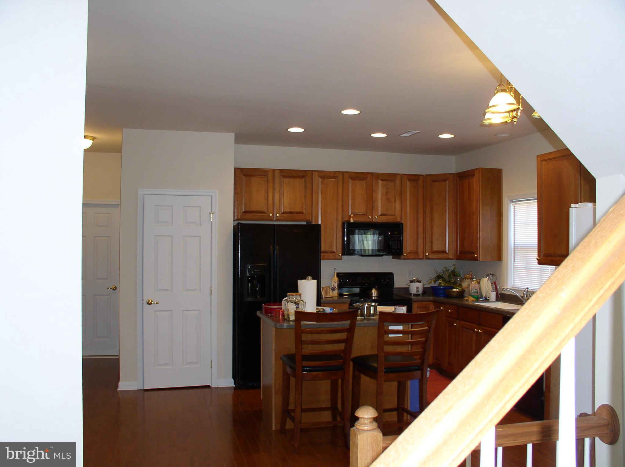169 Thomas Jefferson Terrace Elkton, MD 21921 - Photo 5 of 19 a kitchen with stainless steel appliances granite countertop a refrigerator stove top oven a sink and dishwasher