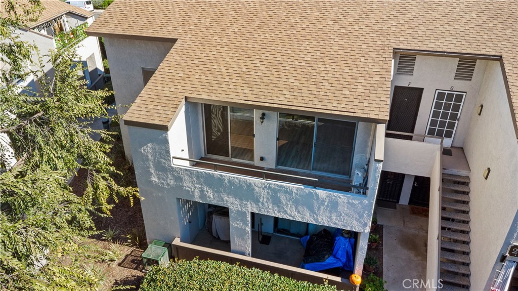 21921 Rimhurst Drive, Unit 128 Lake Forest, CA 92630 - Photo 20 of 24 a view of a house with a balcony