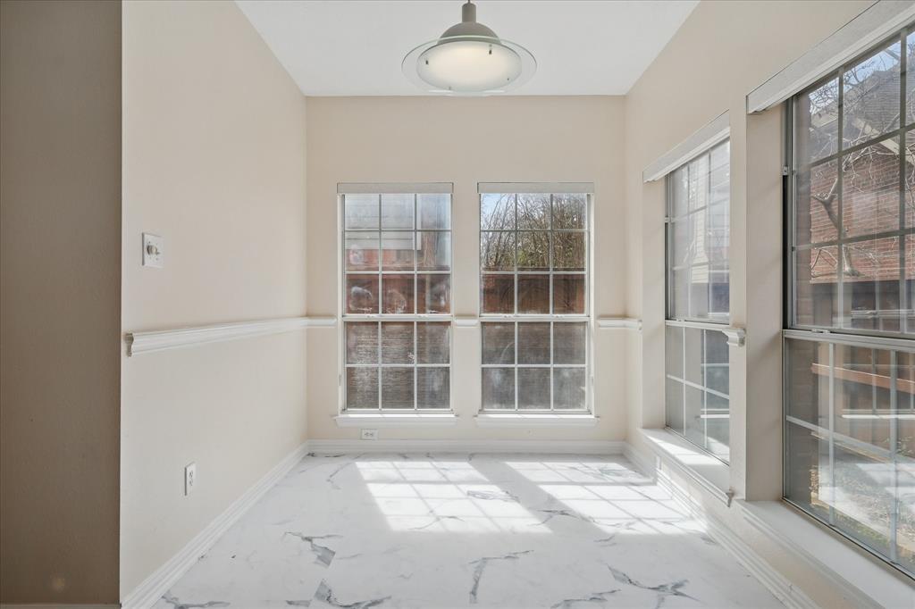 14625 Windsor Court Addison, TX 75001 - Photo 15 of 40 a view of empty room with windows