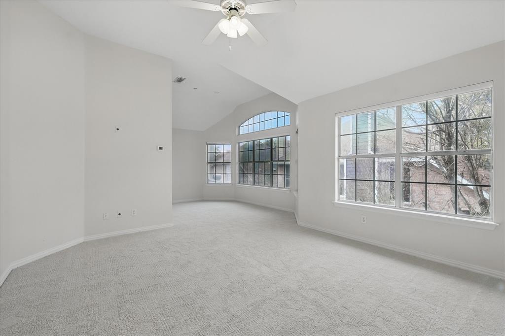 14625 Windsor Court Addison, TX 75001 - Photo 19 of 40 a view of an empty room with a window