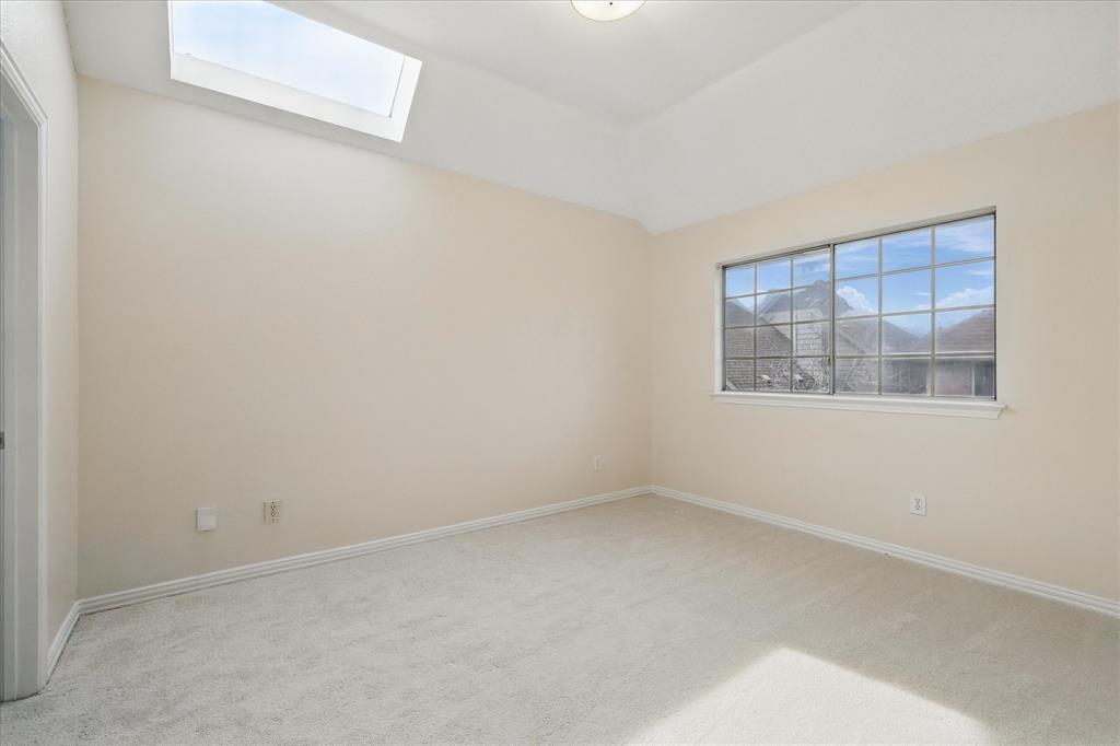 14625 Windsor Court Addison, TX 75001 - Photo 28 of 40 an empty room with a window