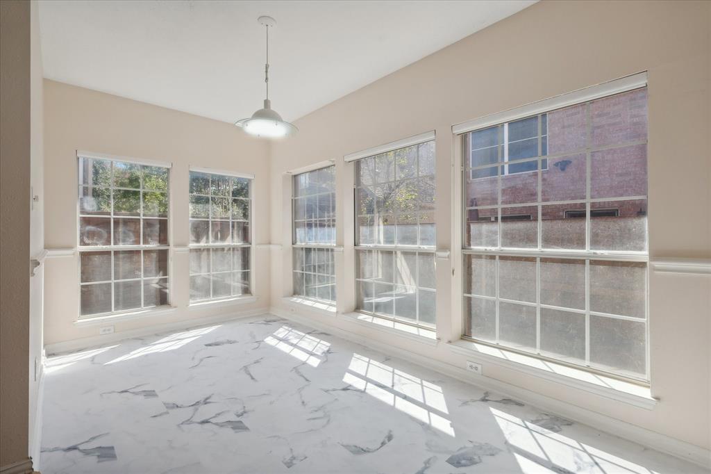 14625 Windsor Court Addison, TX 75001 - Photo 30 of 40 a view of empty room with windows