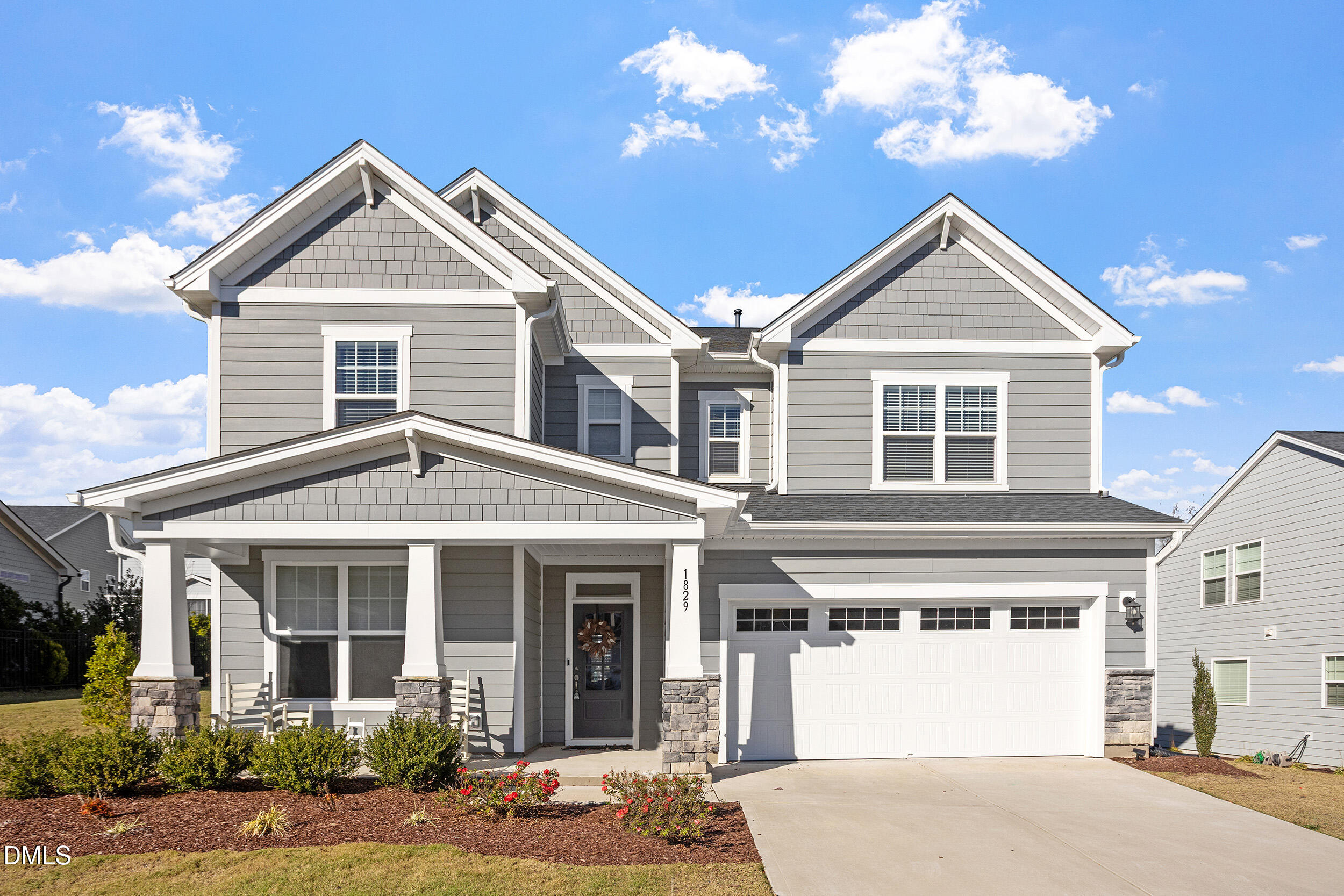 1829 Knights Crest Way Wake Forest, NC 27587 - Photo 1 of 45 a front view of a house with a yard