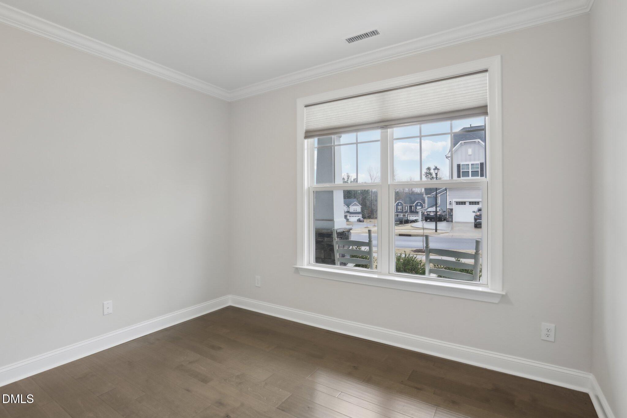 1829 Knights Crest Way Wake Forest, NC 27587 - Photo 20 of 45 an empty room with a window