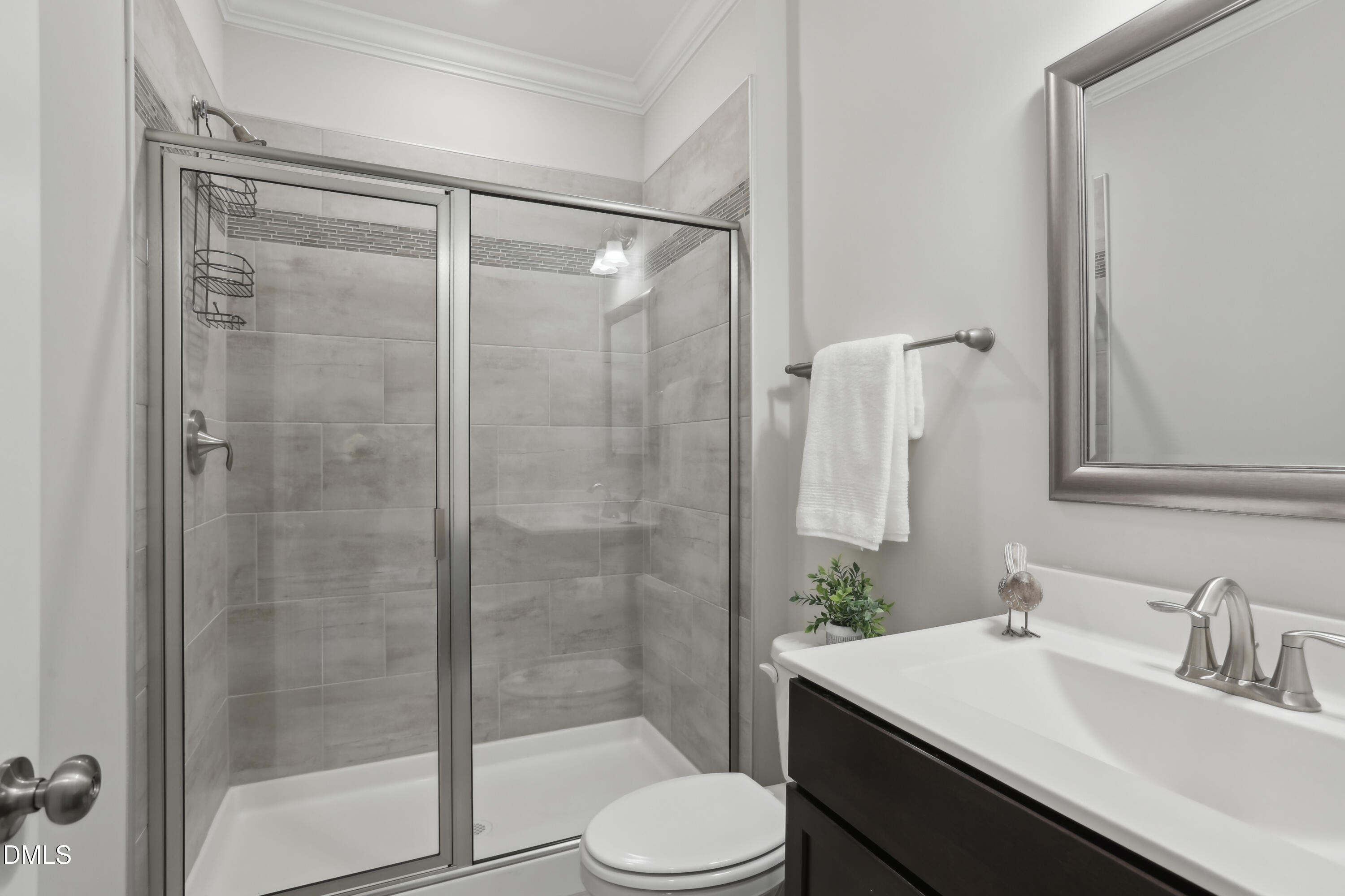 1829 Knights Crest Way Wake Forest, NC 27587 - Photo 21 of 45 a bathroom with a sink toilet and shower
