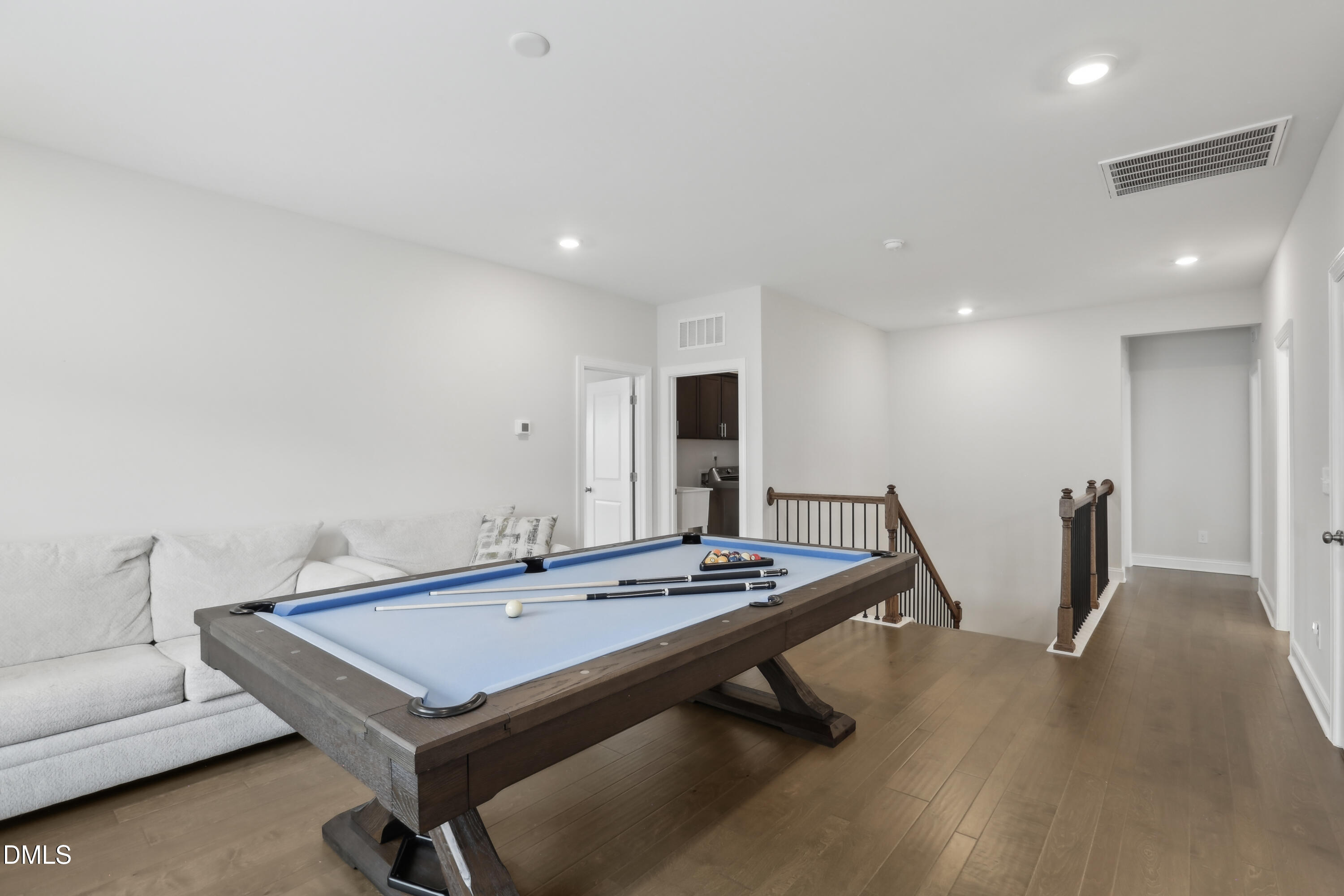 1829 Knights Crest Way Wake Forest, NC 27587 - Photo 25 of 45 a living room with furniture and wooden floor