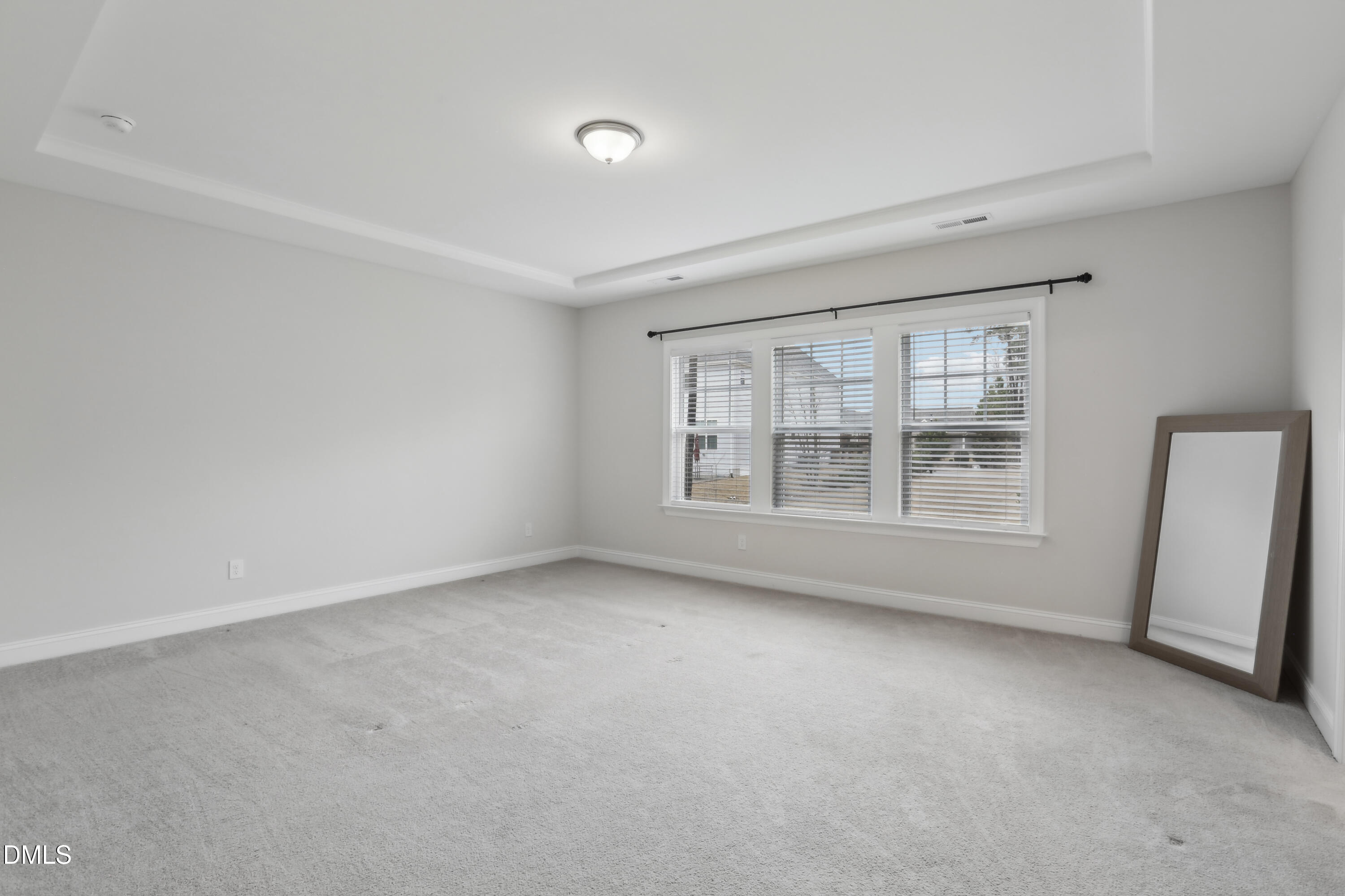 1829 Knights Crest Way Wake Forest, NC 27587 - Photo 27 of 45 a view of an empty room with a window