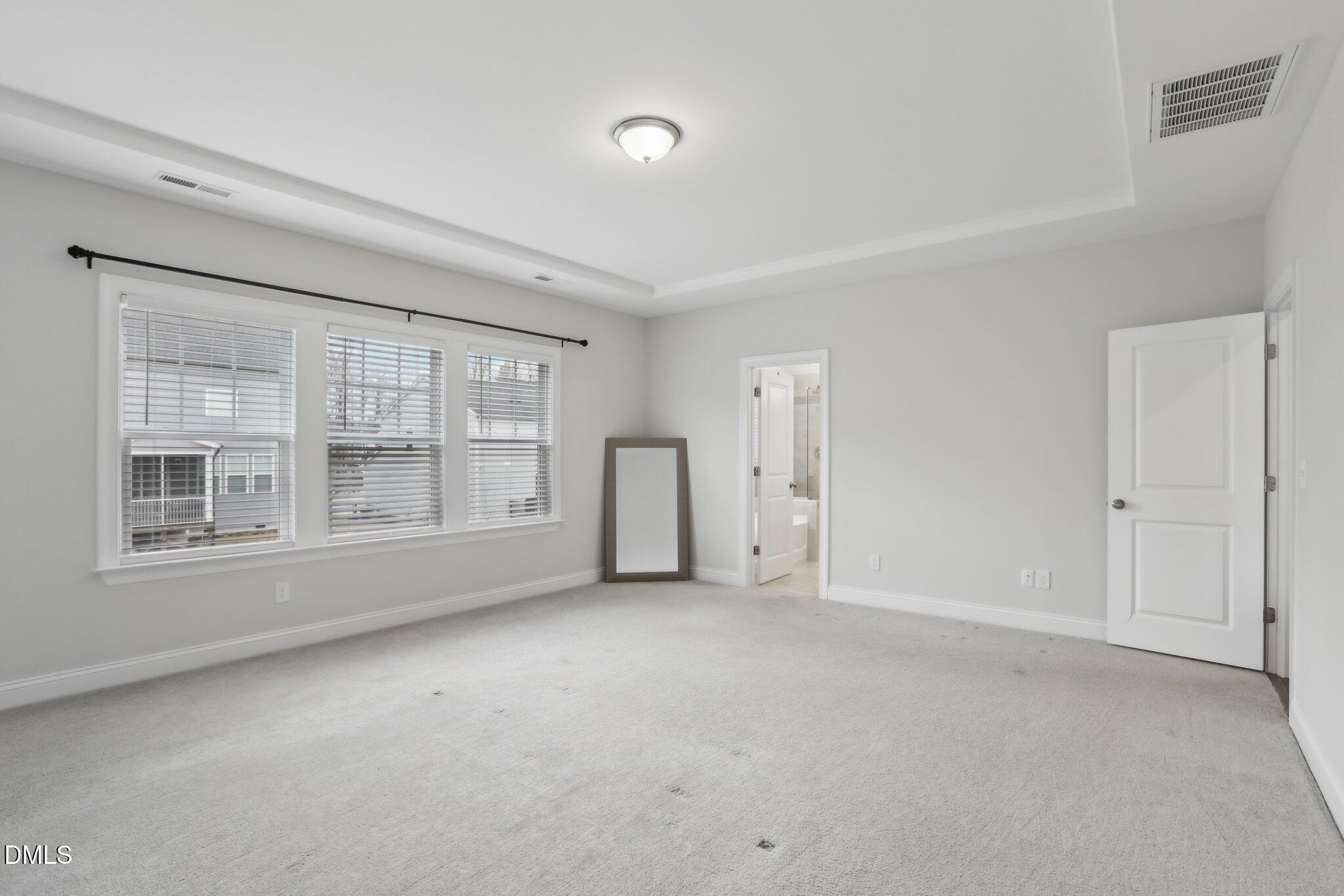 1829 Knights Crest Way Wake Forest, NC 27587 - Photo 28 of 45 a view of an empty room with a window