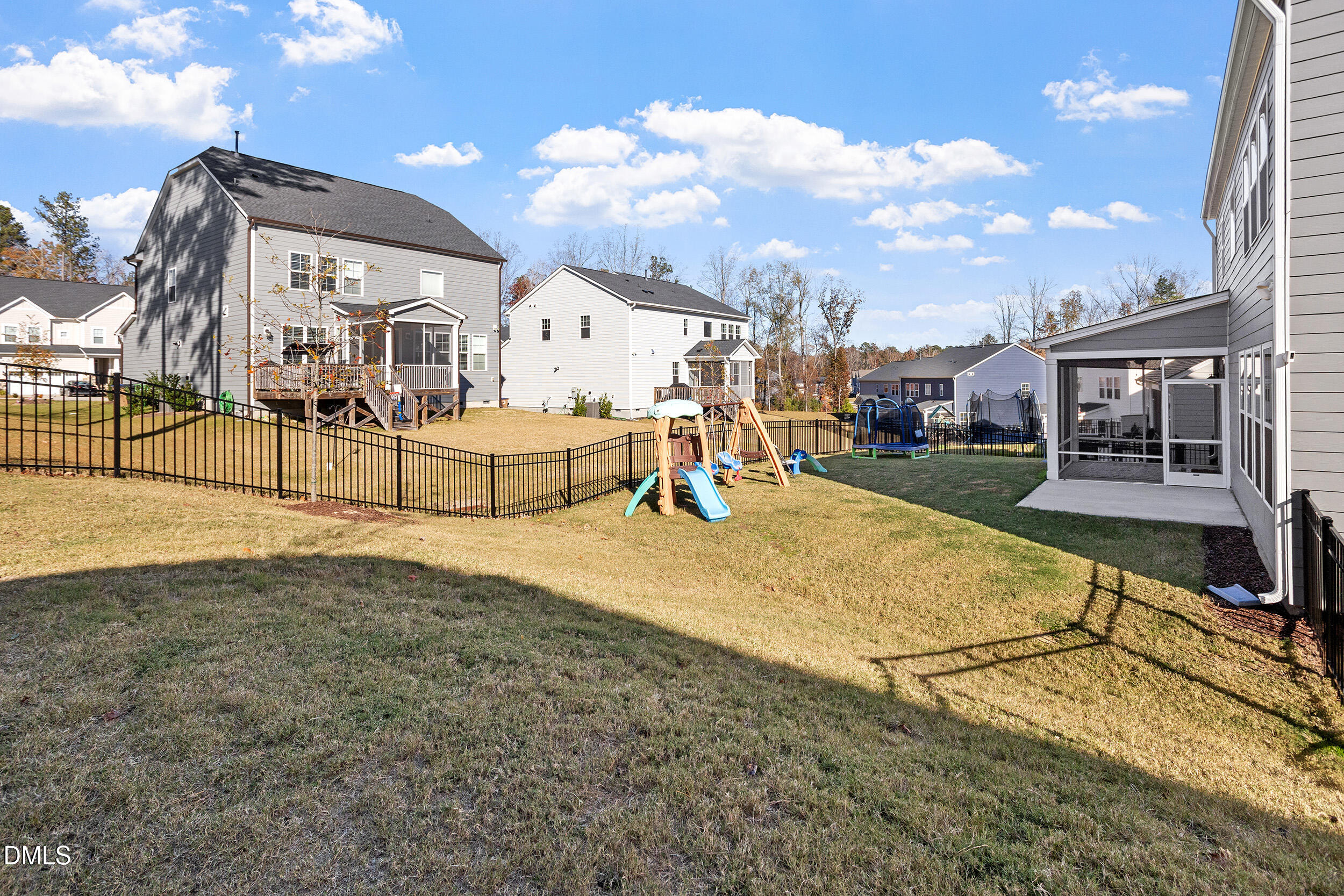 1829 Knights Crest Way Wake Forest, NC 27587 - Photo 44 of 45 a front view of a house with swimming pool