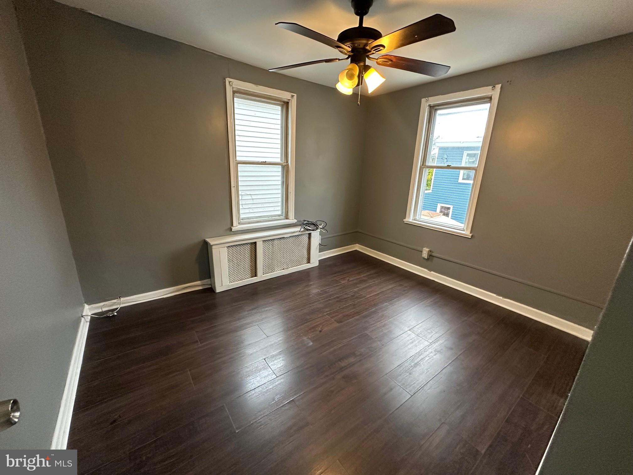 2349 Duncan Street Philadelphia, PA 19124 - Photo 9 of 13 a view of an empty room with wooden floor and a window
