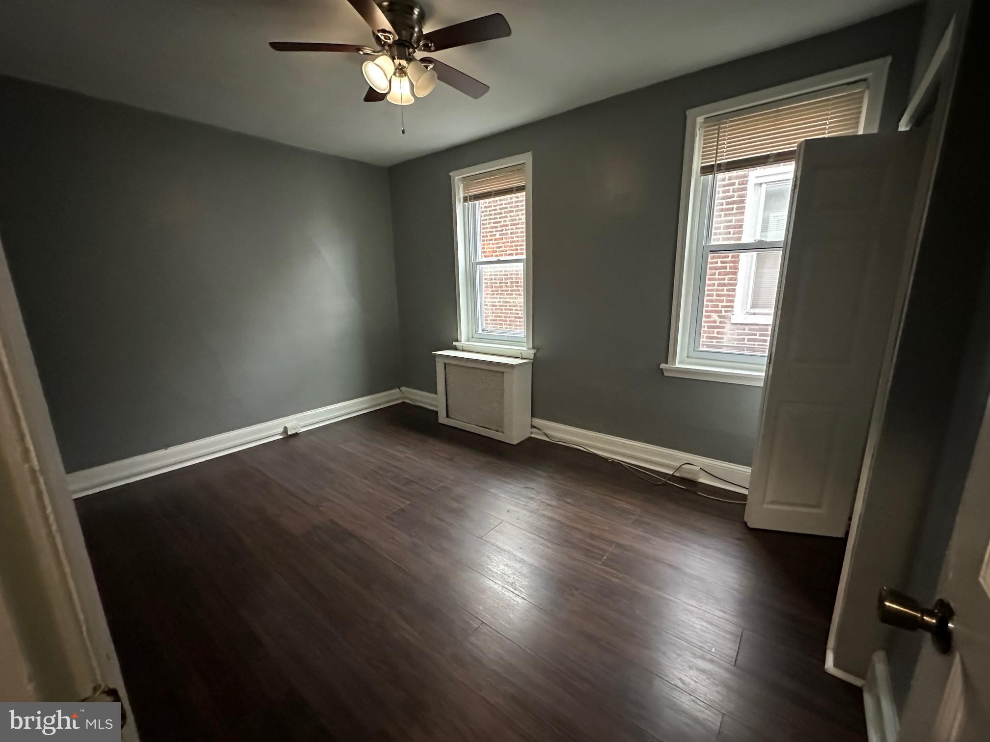 2349 Duncan Street Philadelphia, PA 19124 - Photo 10 of 13 a view of an empty room with wooden floor and a window