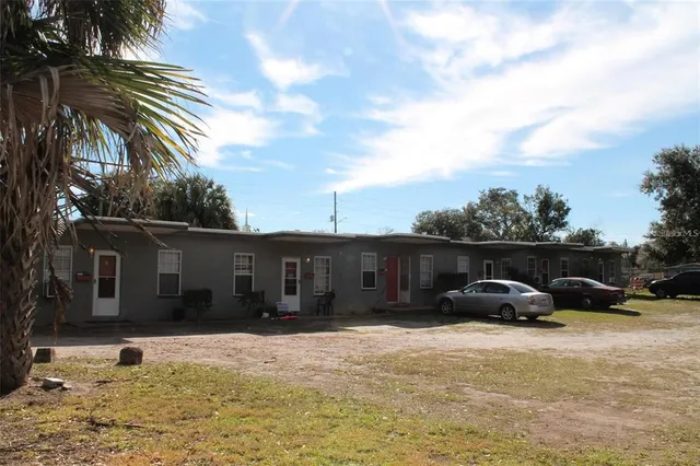 a view of a car parked in front of a house