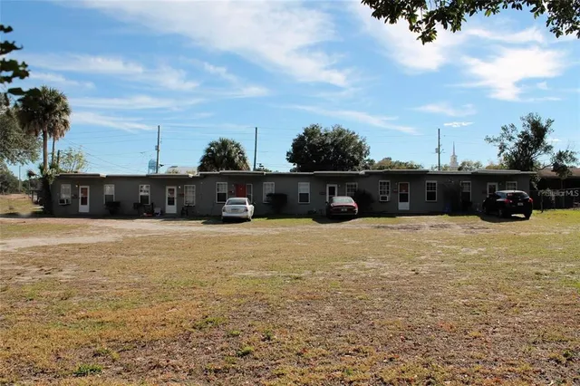 a view of swimming pool with outdoor seating