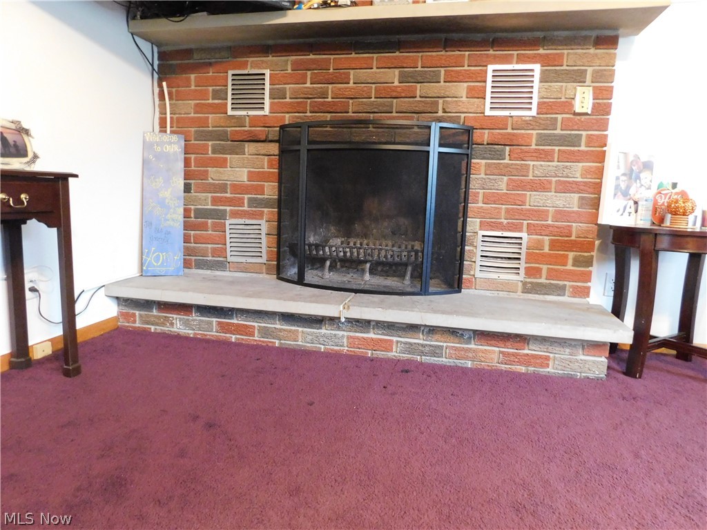 4405 Austin Road Geneva, OH 44041 - Photo 5 of 15 Wood burning fireplace in Living Room